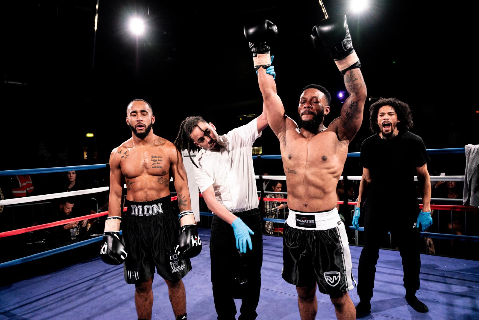 Seleta has his hand raised after his amateur boxing debut win